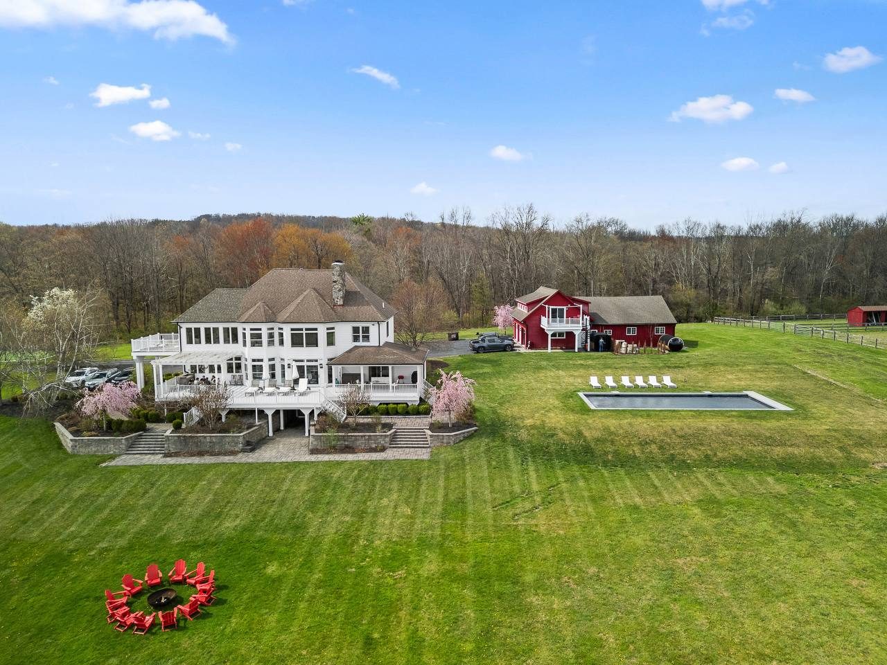 The Westtown Reset estate in spring — private rental property in upstate New York with cherry blossoms